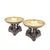 A pair of French Empire bronze tazzas raised on dolphin supports, cast in the early 19th century. Each shallow dish has a...