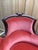 A two-seater louis-philippe style loveseat, napoleon iii period, circa 1850-1870, in solid dark brown stained mahogany....