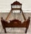 This is a beautiful antique Victorian walnut daybed or youth bed dating to the late 19th century. Features an ornate...