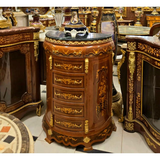 Bring timeless French sophistication into your home with this magnificent Louis XVI semainier chest, expertly handcrafted...