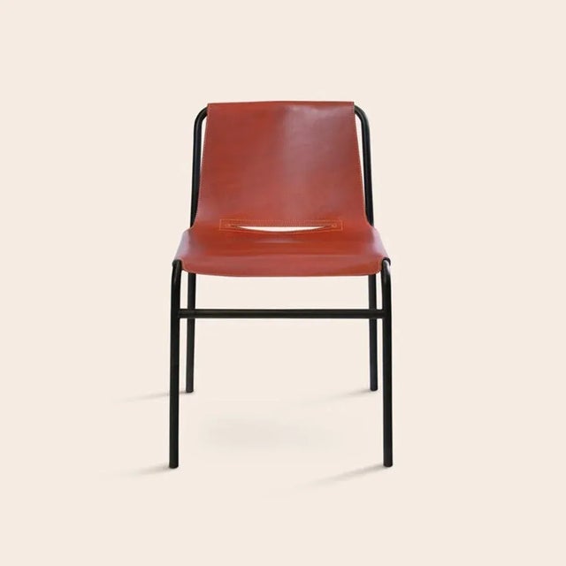 Cognac September dining chair by Ox Denmarq Dimensions: D 54 x W 48 x H 80 cm Materials: leather, black powder coated steel