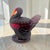 A Mid-Century Modern figural candy dish in ruby red Amberina glass attributed to L.E. Smith, modeled as a stylized turkey...
