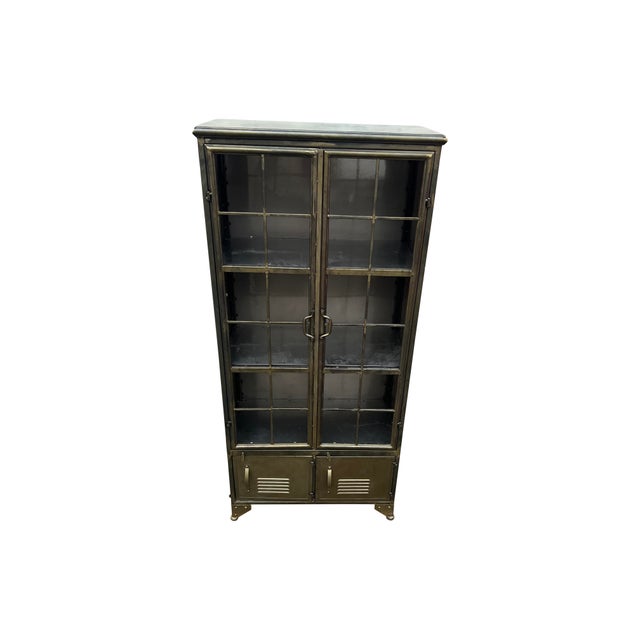 Industrial locker style all metal no glass cabinet. Has 2 doors with open pane design, bottom has 2 locker style doors....