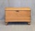 A lovely antique early 1900s rustic German natural pine blanket chest that stands on distinctive oversized turnip feet...