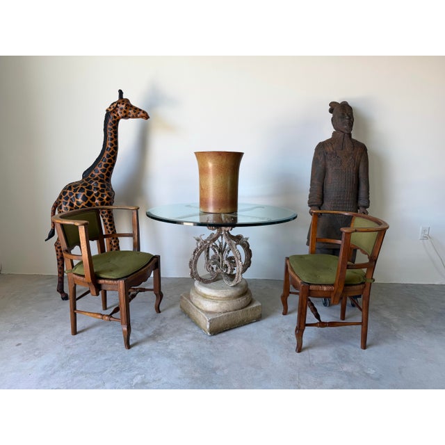 A striking and sculptural statement piece, this vintage giraffe features a hand-crafted form wrapped in richly toned...