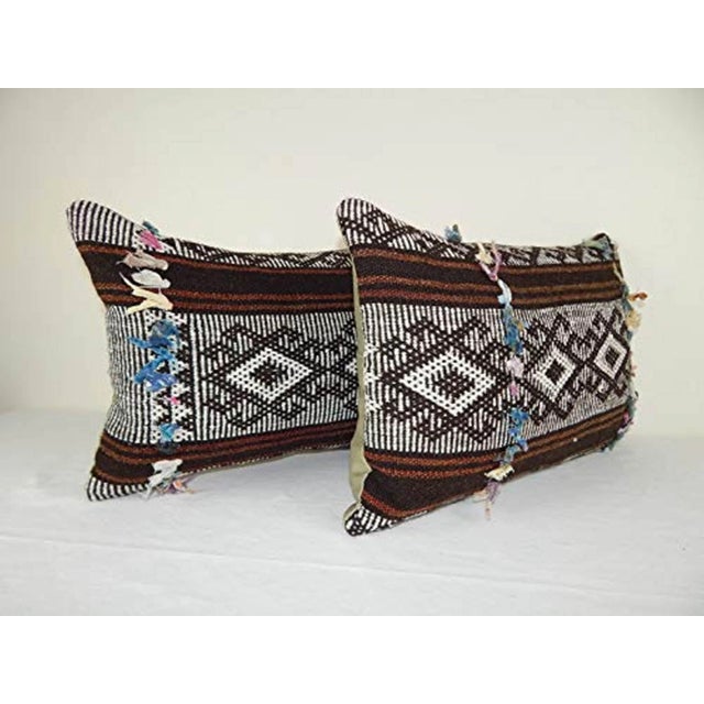 This handwoven kilim pillow is made from Anatolia and Middleast Kilim fragments. Each of our kilim pillow cover is cut...