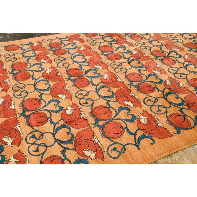 Hand-knotted in wool and originating circa 1900-1909, this 8x11 Lori Baft rug joins Rug & Kilim's Antique collection. It...