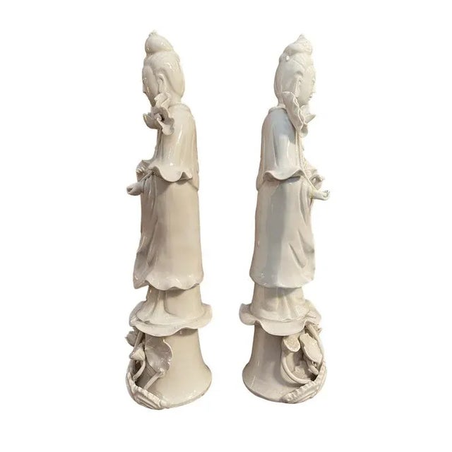 Pair of Guanyin, ceramic statues, China, 19th century Refined pair of Chinese ceramics, depicting female figures on an...