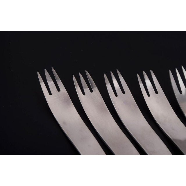 Arne Jacobsen for Anton Michelsen, set of six dinner forks. Set of six stainless steel dinner forks featuring Arne...