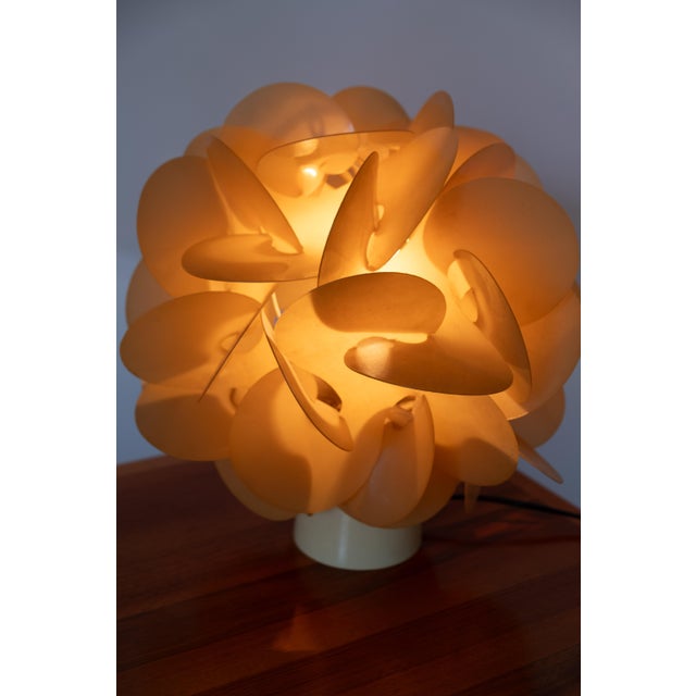 “Rose des sables” table lamp, France, circa 1968 . Table lamp with a reflector composed of interlocking yellowed rhodoïd...