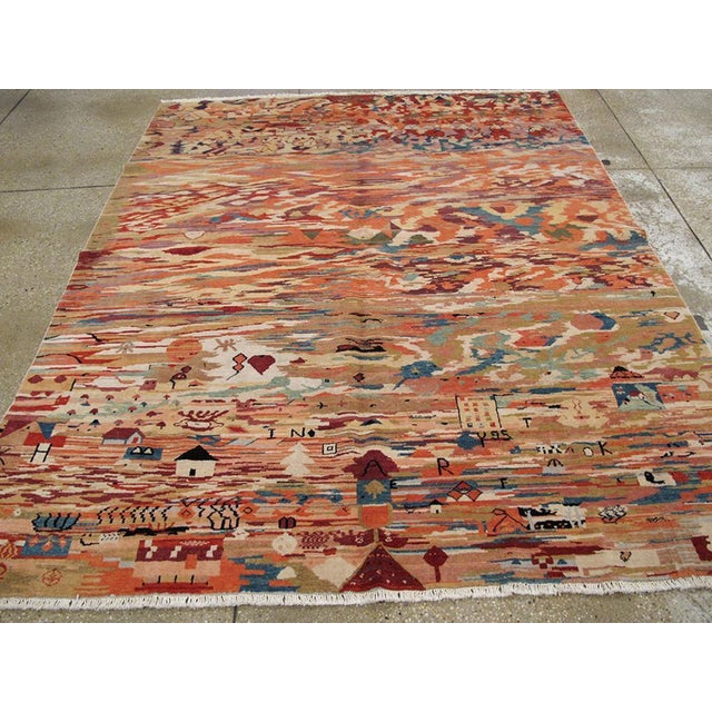 This mid-20th century Turkish Anatolian accent rug, measuring 6' 5" x 7' 7", presents a captivating fusion of tradition...