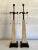 Exceptional pair of vintage table lamps featuring tall, tapered obelisk-form bodies crafted from richly textured natural...