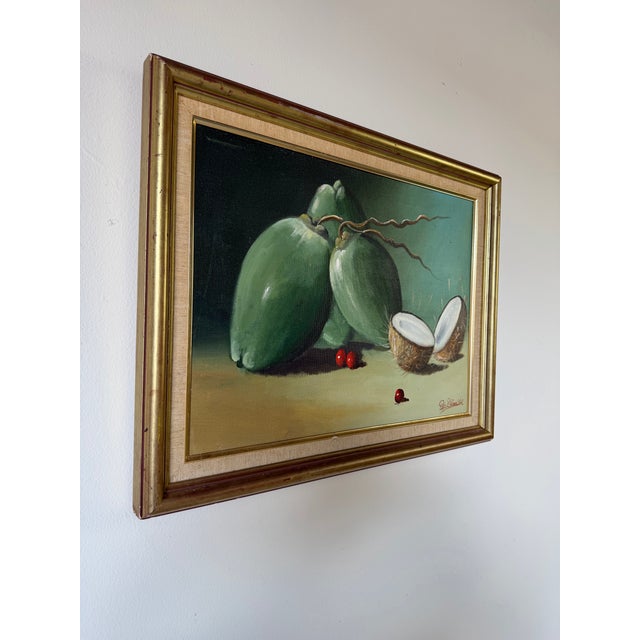 A charming 1980s vintage still life oil painting by G. H. Grande, featuring a tropical composition of green coconuts and a...