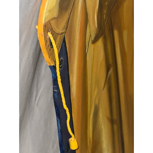 Bring a touch of Americana realism into your space with Yellow Slicker by Marylyn Lanardo. This striking piece captures...