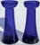 A beautiful pair of antique hand-blown cobalt bulb forcing glasses, their gently swirling bodies and visible pontil marks...
