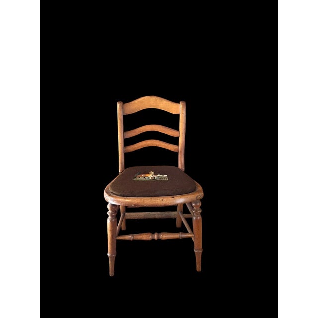 A Adorable Antique Child’s Chair. It’s been in my family for over 50 years and is in excellent condition.