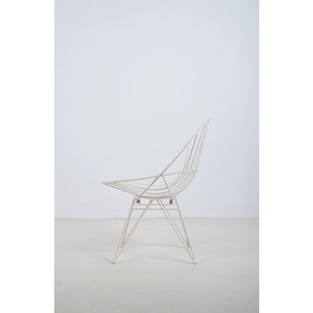Vintage wire chair from the fifties of the model "Combex". This chair was designed by the well-known Cees Braakman and was...