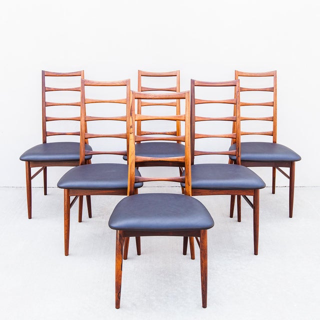 A meticulously restored set of six “Lis” chairs in Brazilian rosewood by Niels Koefoed, produced in Denmark in c. 1960s by...
