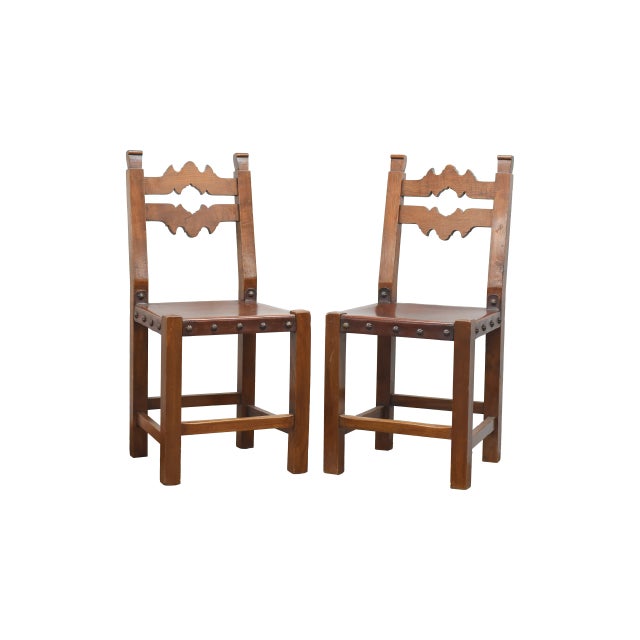 Beautiful pair of Spanish chairs made of walnut and the seat in leather. they are in perfect conditions and they are very...