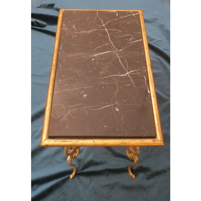 Mid century wrought iron coffee table with veined marble top, France 1940-50