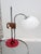 Magnificent designer table lamp by Pinokio. Spain, 1970s. Red lacquered metal base. The structure is chromed metal with a...