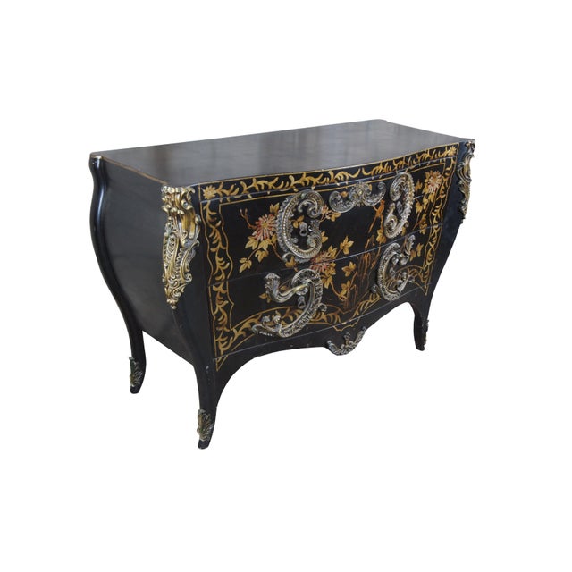 A lovely early 21st century Louis XV style Chinoiserie commode. Features a black painted finish with foliate,...