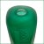 This is a hand blown art glass perfume bottle. The green frost body of the bottle is etched with high tech geometric...
