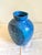 This vintage studio pottery vase/ water jug has a stunning mottled blue effect . It's the perfect anchor to floral...