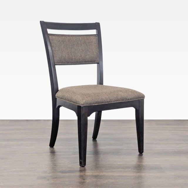 Upholstered back and seat. Brand: Universal Furniture. Dimensions (in): 23W x 24D x 38H.