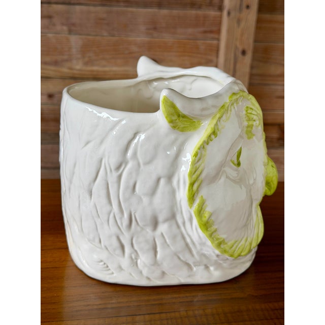 A charming vintage sculptural ceramic owl planter or cachepot finished in glossy white with hand-applied lime green...