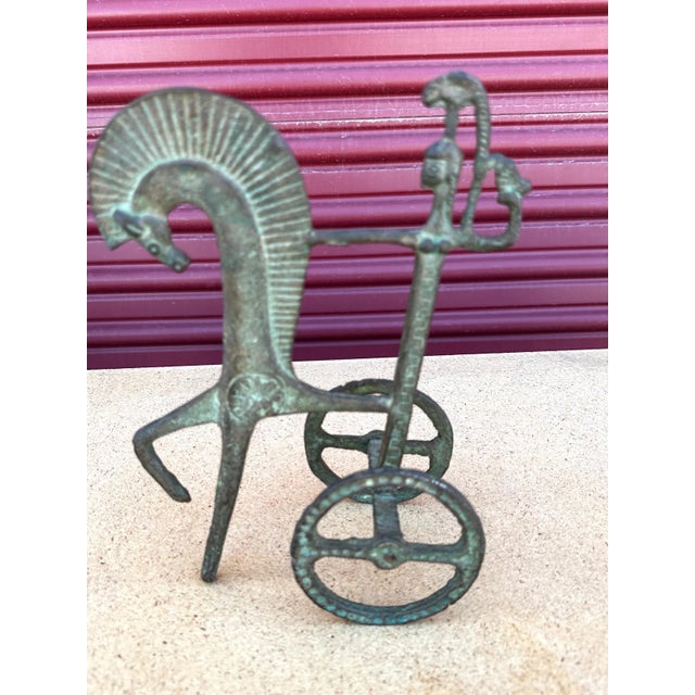 This is a brass sculpture, which may have been done by Frederic Weinberg. It is an incredibly stylized Roman Chariot and...