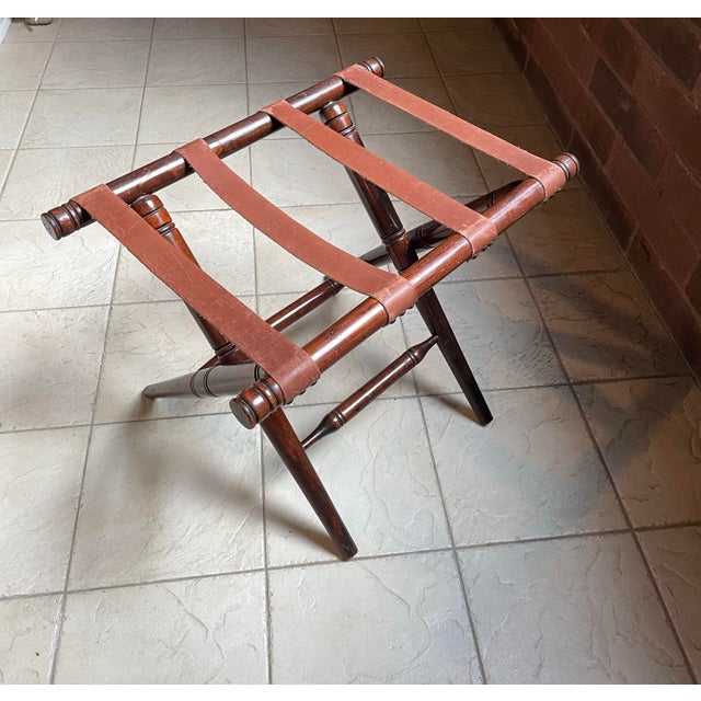 An exceptional antique luggage rack dating to the late 1930s–early 1940s, crafted from solid hardwood and fitted with...