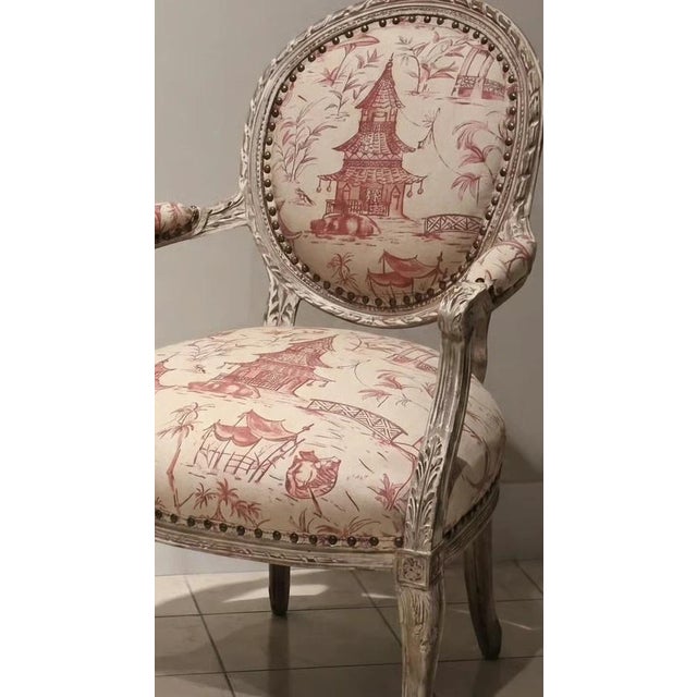 This chair has been crafted in the manner of Louis XVI, which has been reupholstered in a stunning Asian linen toile. The...
