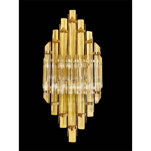 Venini wall lamp in Murano glass with iridium glass. The design and the quality of the glass make this piece the best in...