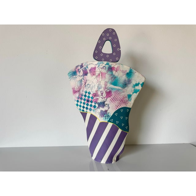 A striking and playful large-scale ceramic vase by artist Zufelt, C.1990s. This sculptural piece exemplifies Postmodern...