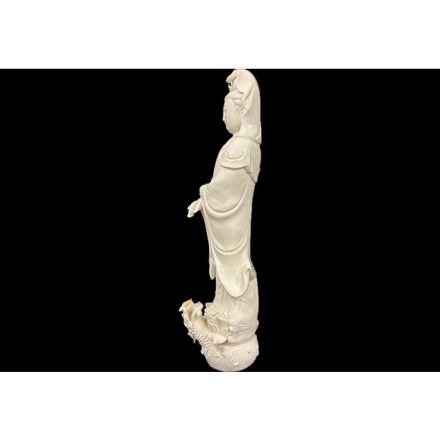 Chinese Blanc-de-Chine white-glazed Porcelain Figure of Guanyin, the revered Buddhist bodhisattva associated with...