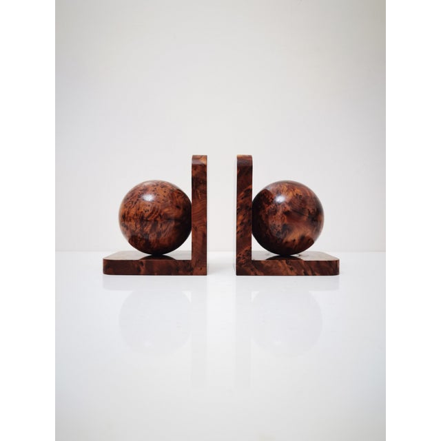 Pair of Ball bookends book ends in polished root burl wood with a very unique deeper color (orangish / reddish brown), a...