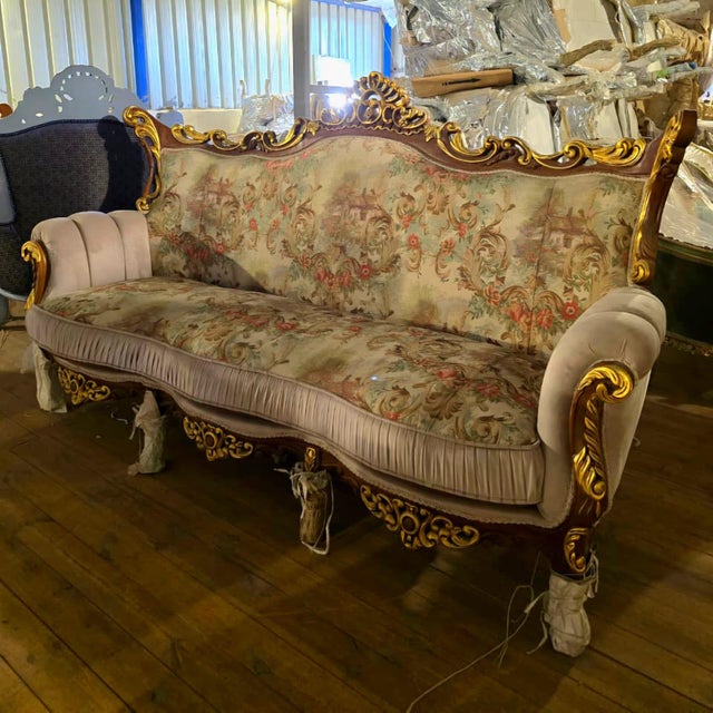 Make an unforgettable statement with this magnificent French Louis XV-style sofa, designed for those who appreciate...