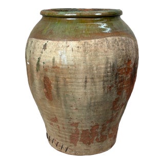 Antique Earthenware Storage Jar With Green Glaze and Staple Repair For Sale