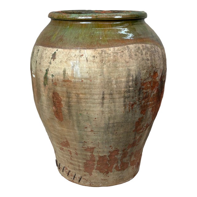 Antique Earthenware Storage Jar With Green Glaze and Staple Repair For Sale