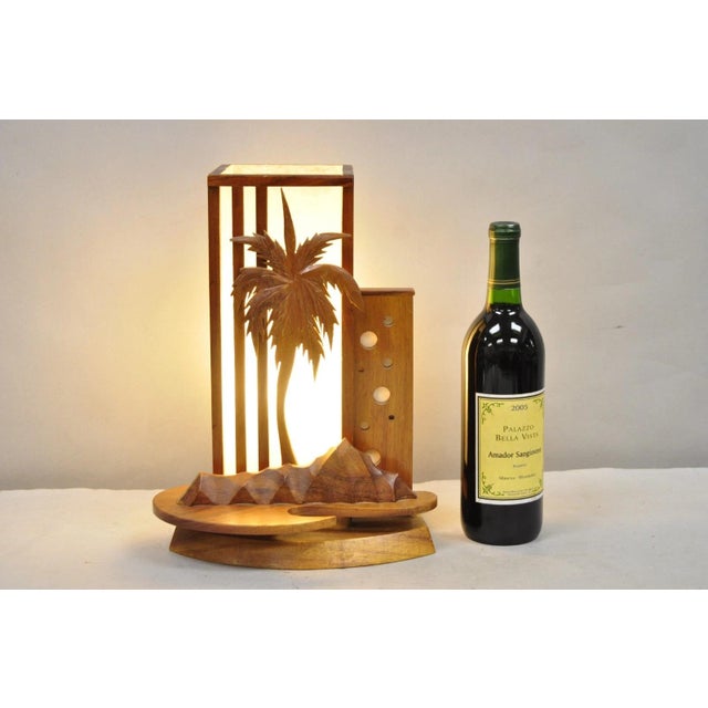 Vintage Mid Century Modern Carved Hawaiian Koa Wood "Palm Tree & Mountains" Small Tiki Table Lamp. Circa Mid 20th Century....