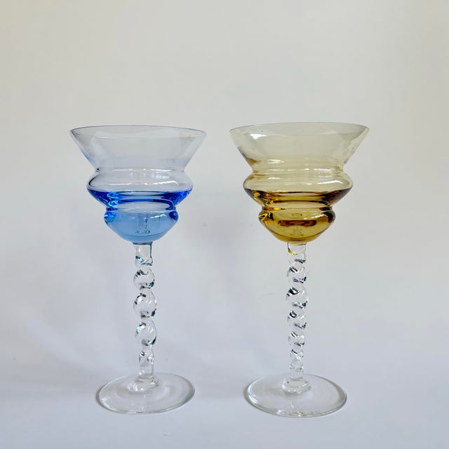 Beautiful set of 2 Mid-Century Modern Empoli Italian drinking glasses, handblown with the signature sculptural design...