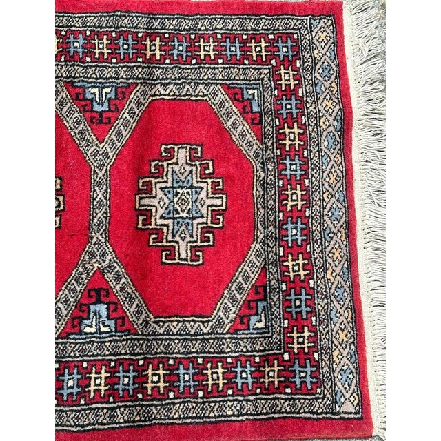Pretty small vintage Pakistani rug with nice geometrical design in style of Turkmen rugs, and beautiful colours with red...