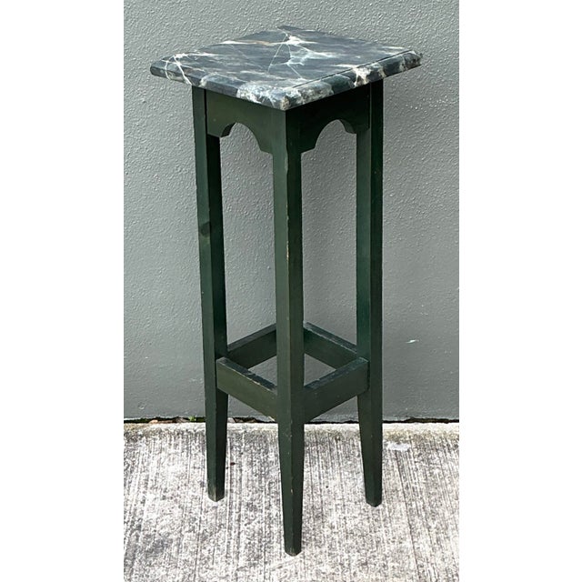 This sophisticated vintage pedestal captures the understated elegance of 1970s Brazilian modernism. Featuring a slender,...