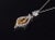 Gorgeous 18K solid gold GIA certified 4.54CTS rare vivid orangy yellow sapphire and diamond pendant. This pendant features...