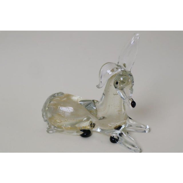 This artistic interpretation of a reclining donkey is both appealing and a political statement; whether one sees the...