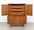 A mid-century modern gentleman's cabinet by American of Martinsville, crafted in walnut with the clean lines and...
