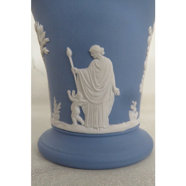 This charming posy pot or small trumpet vase is made of Jasperware ceramic, and is the fabulous Wedgwood Blue color with a...