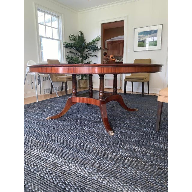 72” traditional round dining table in great condition. Purchased in 2018. Birdcage pedestal. Works great in many dining...