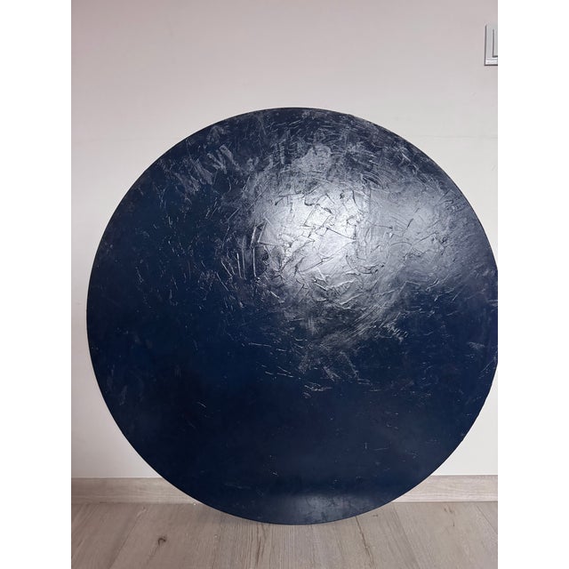 This original, handcrafted circular oil painting features a deep navy blue palette with a rich, tactile surface. Measuring...